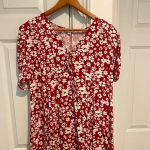 Women’s dress, black and white floral design with red background. Size S